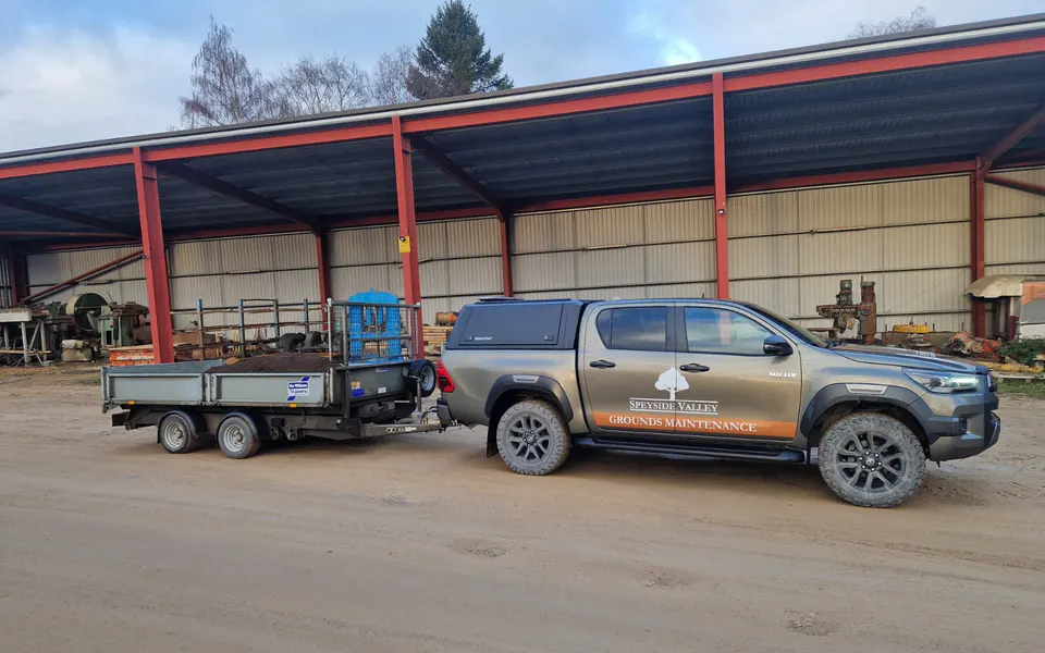 Speyside Valley branded grounds maintenance vehicle and trailer